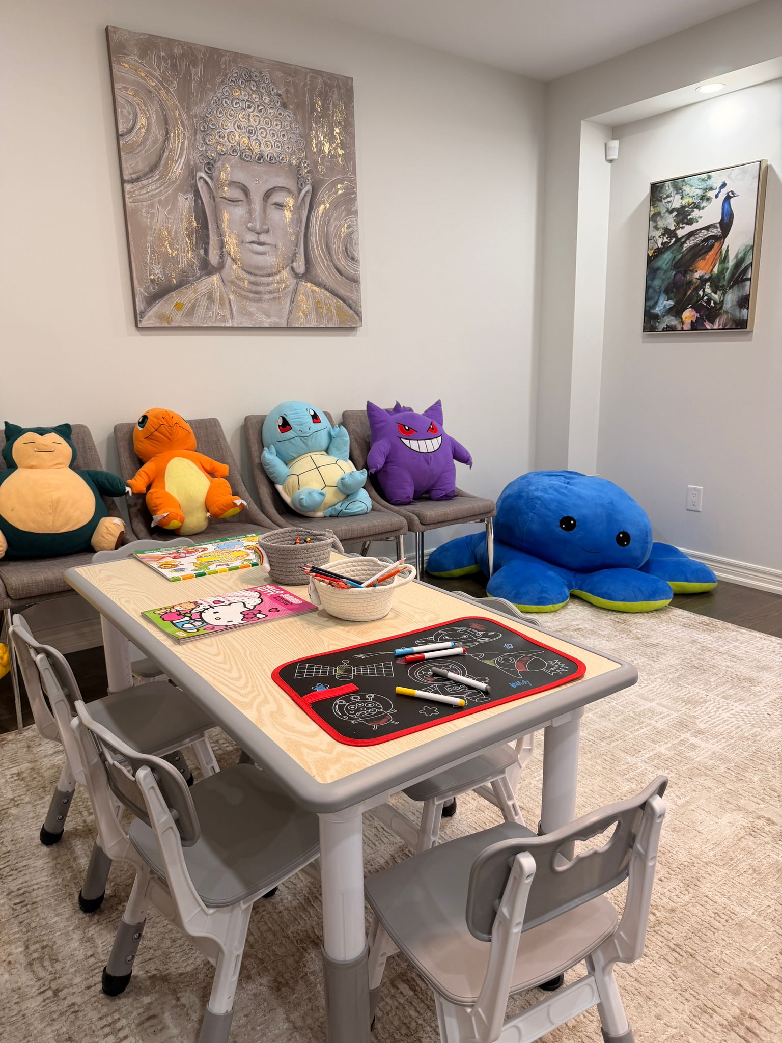 Activity table set up with learning materials and craft supplies