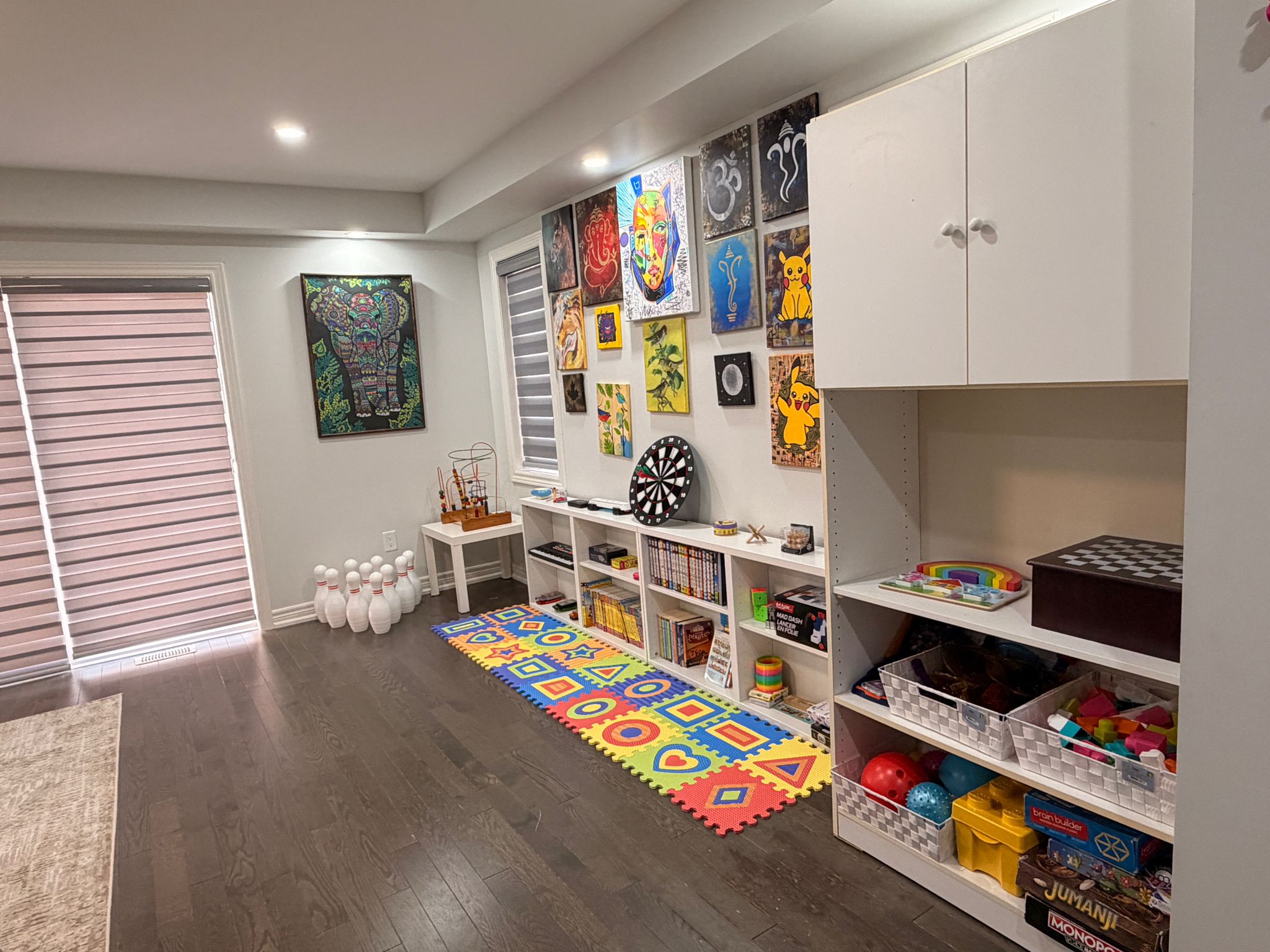 Indoor play area with soft seating and toys for supervised play